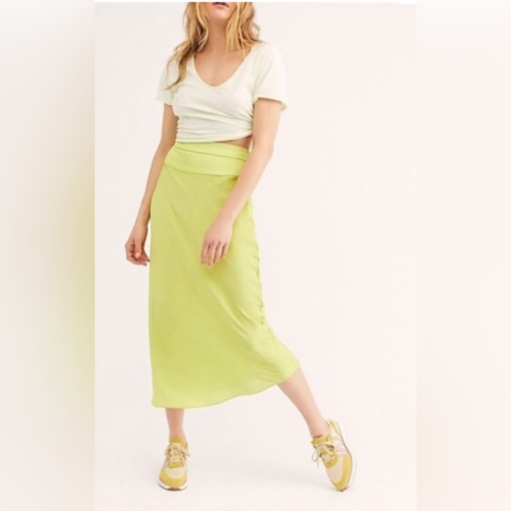 Free people bias cut lemon lime silk skirt, size 8. Great condition.